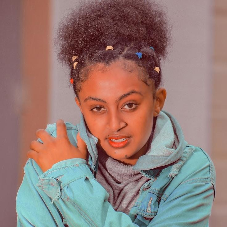 Kaveri Mehta, Lead Design Curator at Solarter Ravia, reviewing corporate floral arrangements